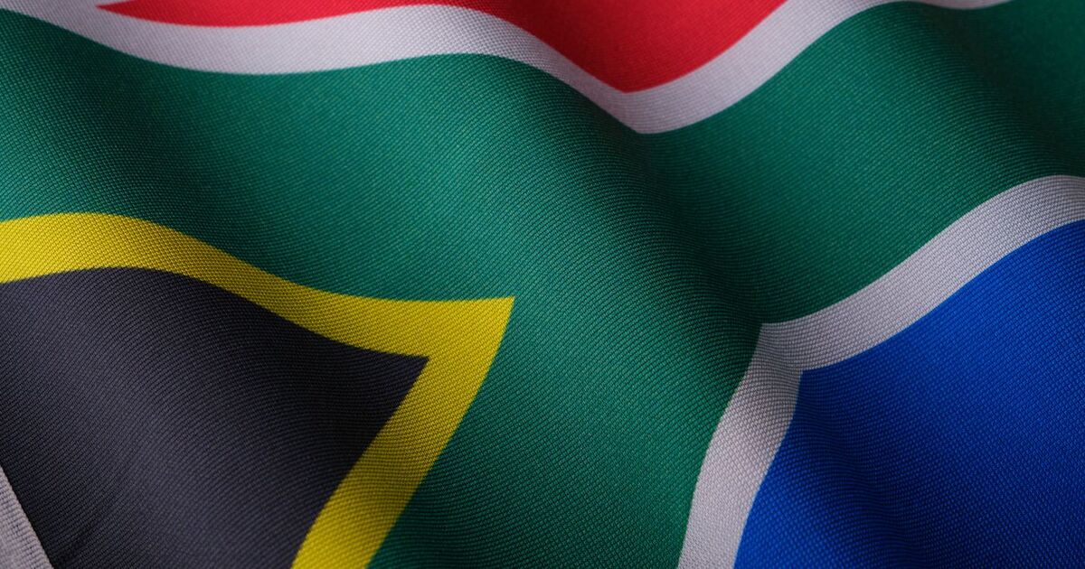 Close-up of a waving South African flag showcasing its vibrant colors and detailed texture.