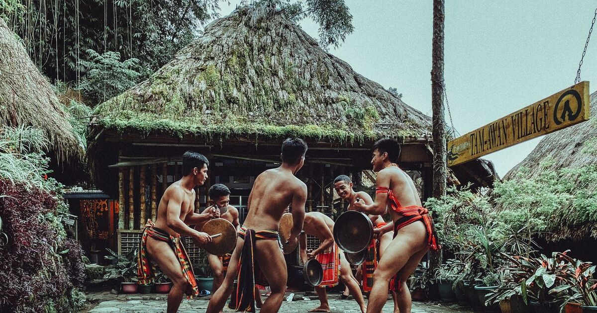 A group of men performing a traditional cultural dance in Baguio's Talipanan Village.